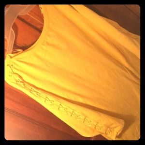 Yellow blouse , with long crisscross sleeves